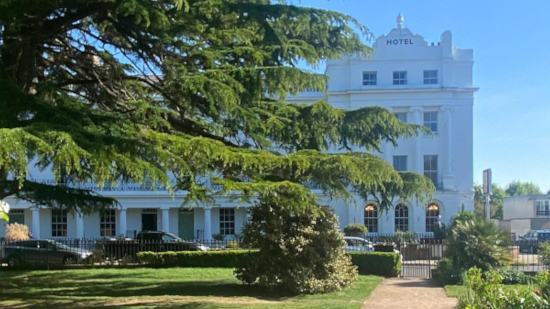 A view of the Anglesey Hotel, Gosport from the Alverstoke Crescent Garden opposite