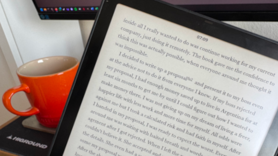 Close-up of a Kindle Paperwhite Signature Edition displaying a page from The Four-Hour Work Week